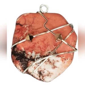 Wire wrapped orange stone pendant